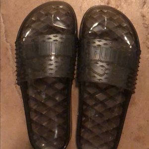 Clear Puma slides. NEVER been worn from Neimans.